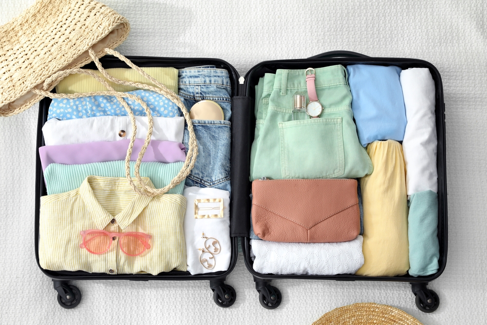 A suitcase filled with matching clothes. 
