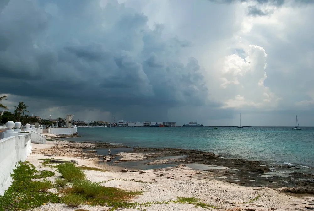 Dark rainclouds over San Miguel's downtown during the overall worst time to visit Cozumel