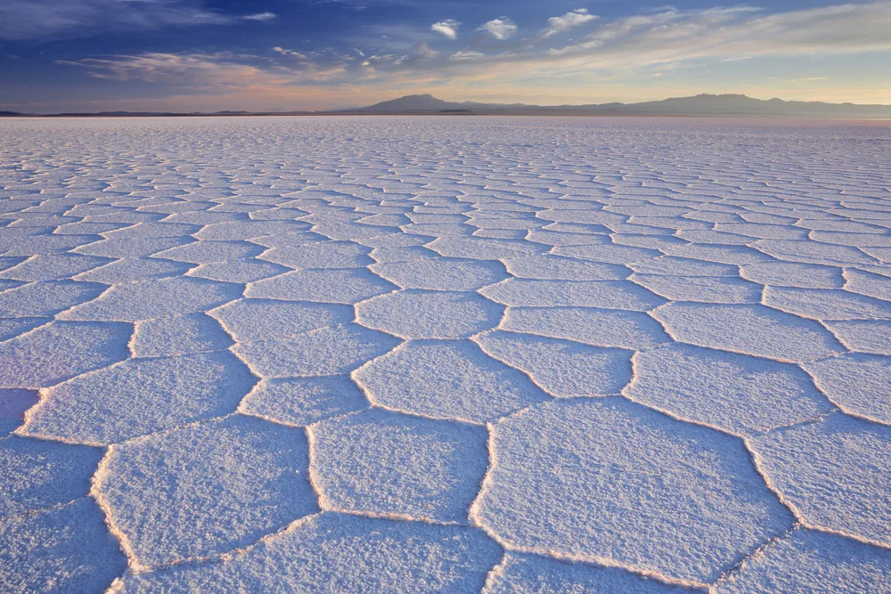 The vast Salar de Uyuni in Bolivia is the world's largest salt flat located in South America.