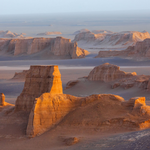 unique land formations where several platue formations in a desert area during the best time to visit in Iran.