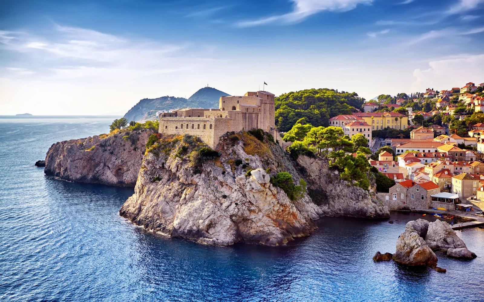 Aerial view of Fortress Lovrijenac and Bokar seen from the ocean during the best time to visit Croatia