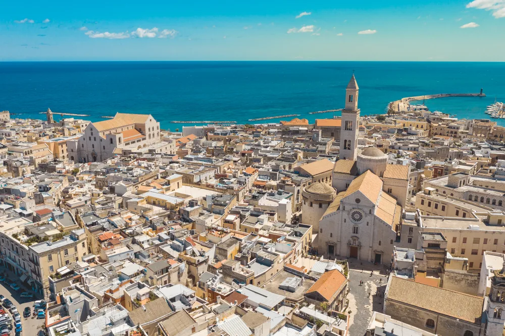 Aerial view of Bari, Italy and its old town with the San Nicola Basilica on the left for a list of the best cities to visit in Italy