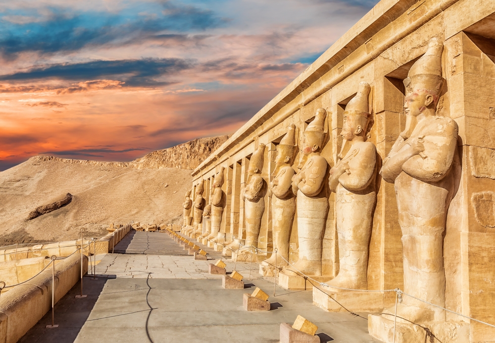 For a guide titled Is Egypt Safe to Visit, a number of columns sit upright outside of the temple of Hatshepsut