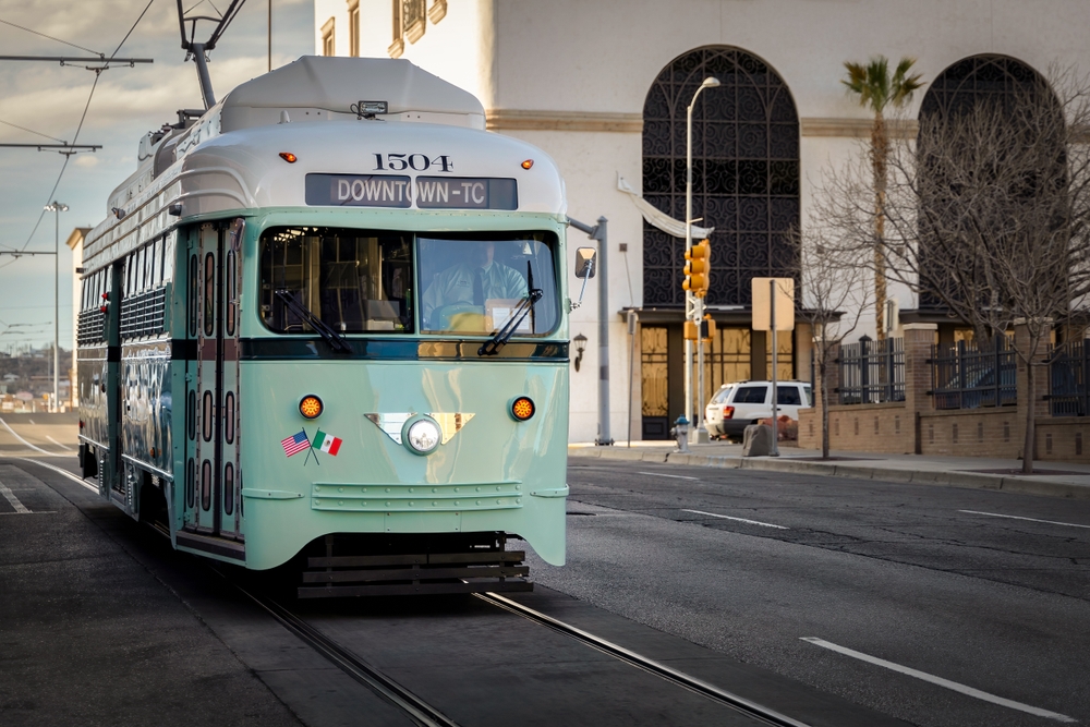 Neat view of a streetcar making its way down the street in downtown El Paso for a guide to whether or not the city is safe to visit