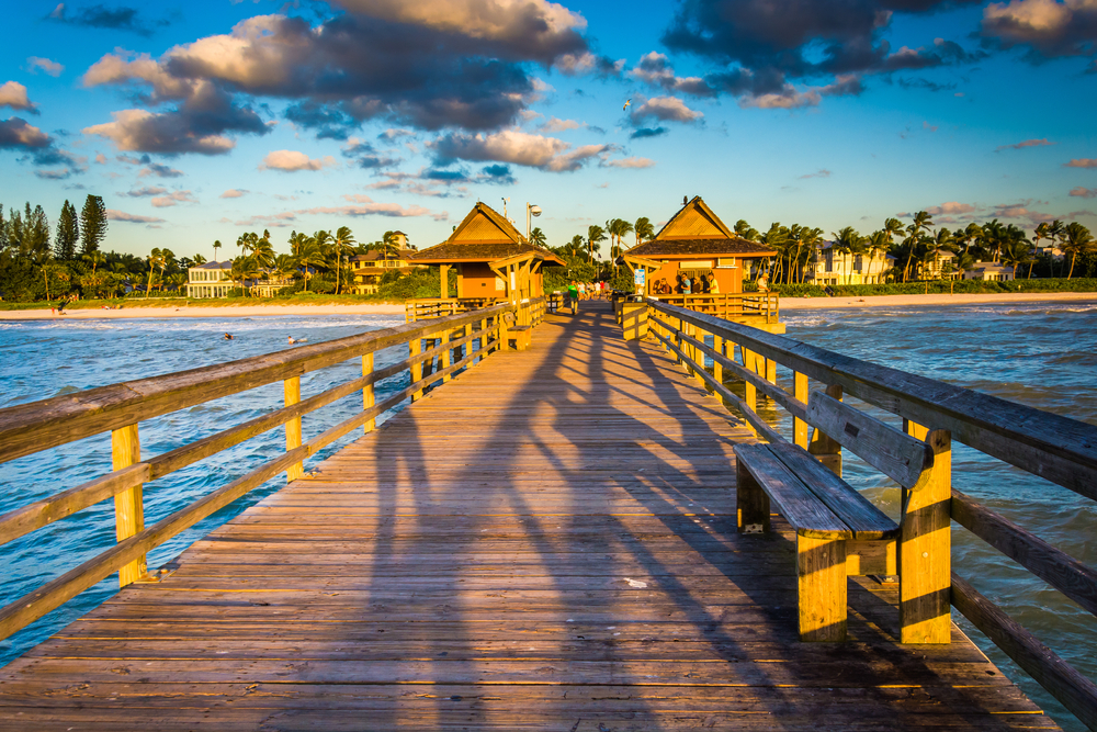 Fishing pier seen at dusk in Naples, Florida for a guide to whether or not it's safe to visit