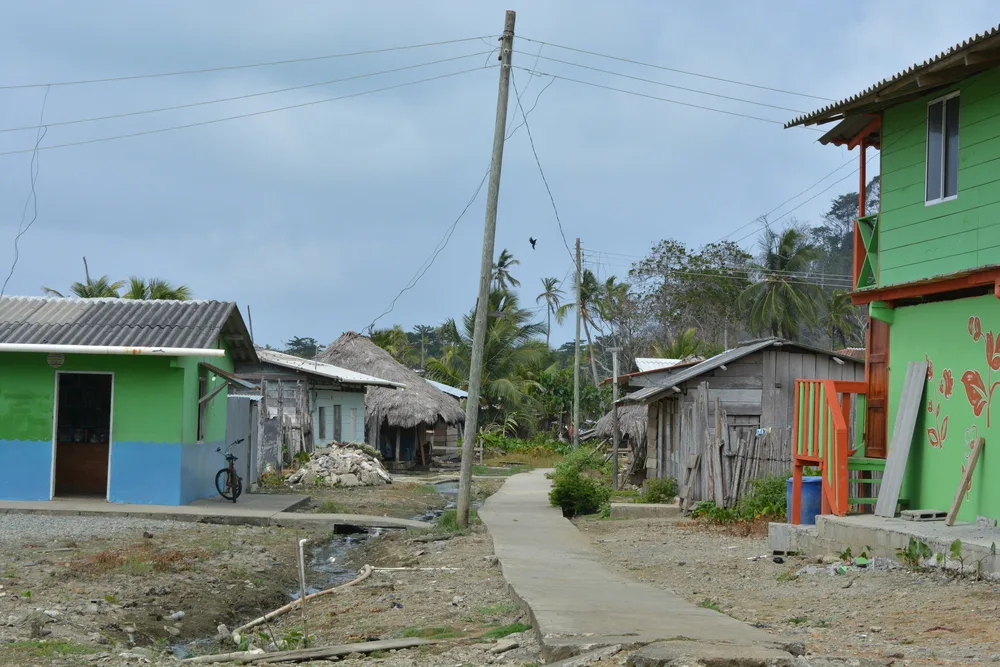 Small village with run down houses and shanties in one of the least safe areas to visit in Panama, the Darien Gap