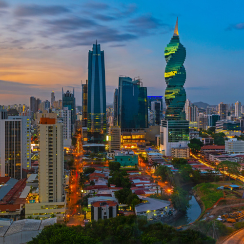 a city skyline during a sunset where buildings are tall and modern, photographed during one of the best time to visit Panama.
