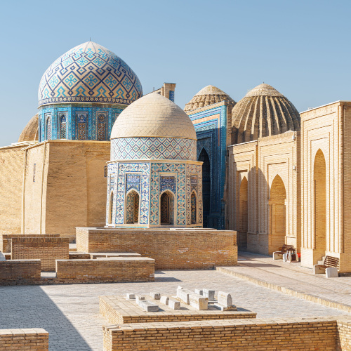 islamic structures with dome roofs, seen during an afternoon of the best time to visit Uzbekistan.