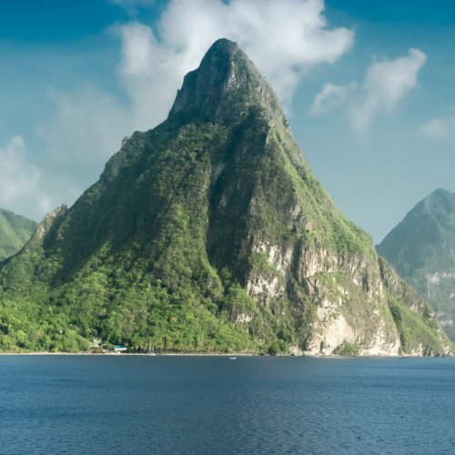a conical mountain on the side of the sea, seen during the best time to visit Saint Lucia.