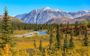 Gorgeous snow-capped mountains of Denali National Park pictured in the spring, one of the best times to visit the park