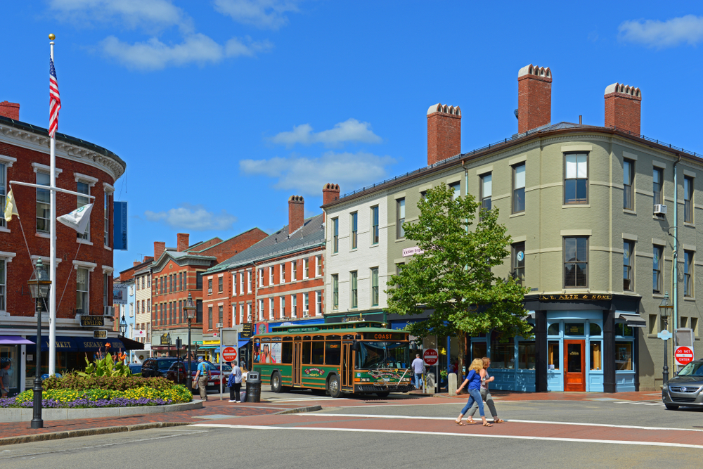 Photo of a historic old square in downtown Portsmouth pictured on a clear summer day during one of the best times to visit New Hampshire