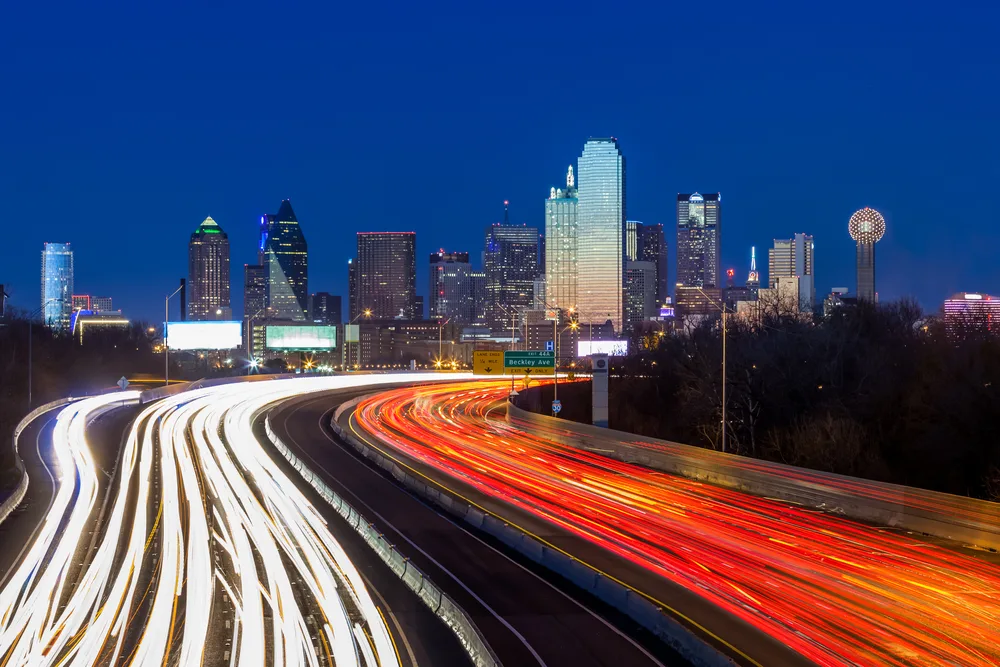 Long shutter image of the city skyline of Dallas pictured during the best time to visit Dallas