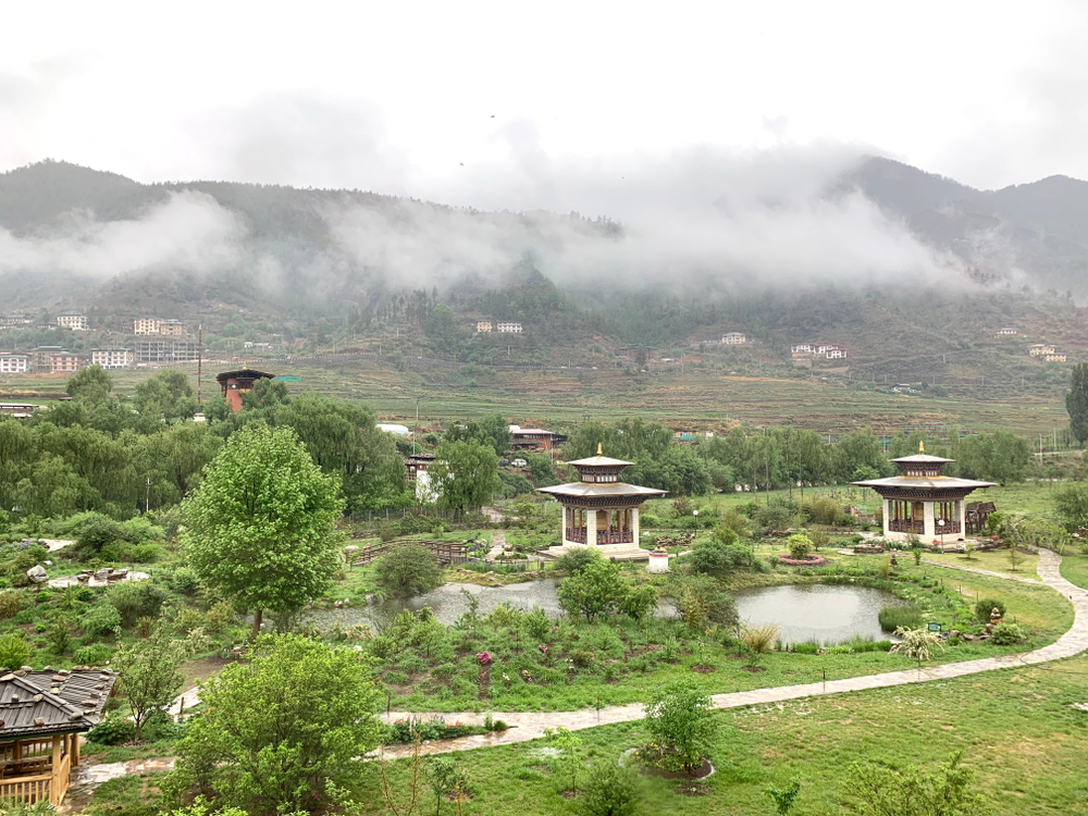 Timbu Valley with ponds forming in the hills pictured during the monsoon season, the overall worst time to visit Bhutan
