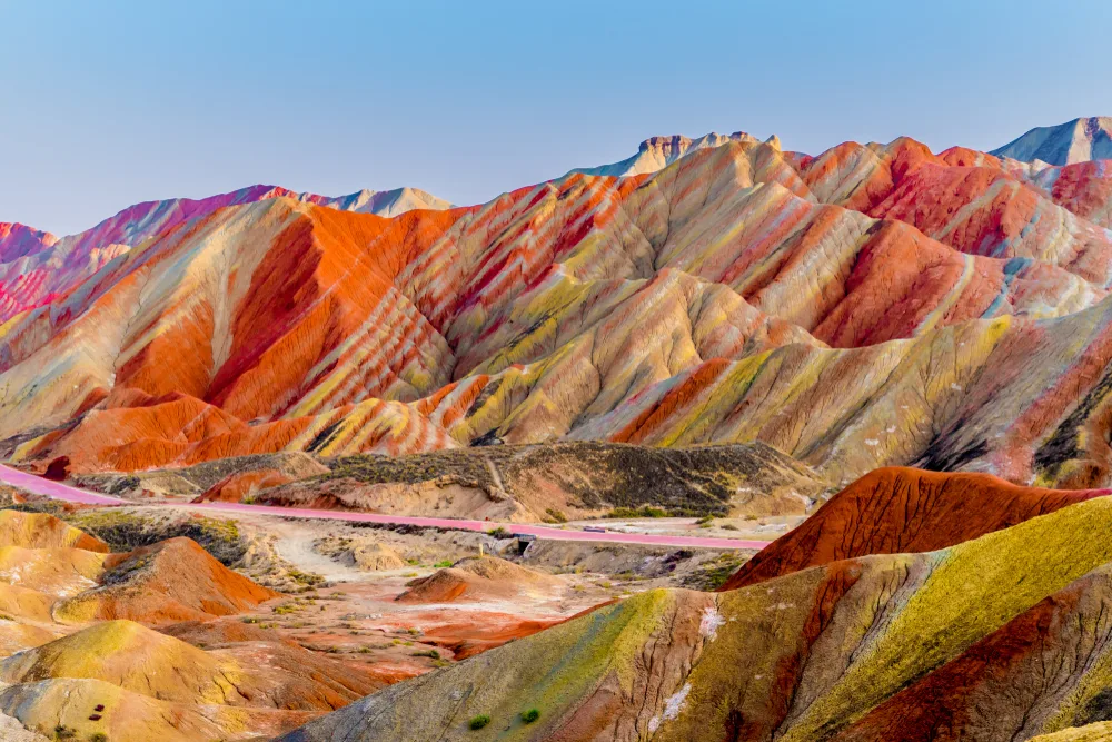 Amazing scenery of Rainbow Mountain in Zhangye Danxia National Park, seen on a clear summer day during the best time to visit China