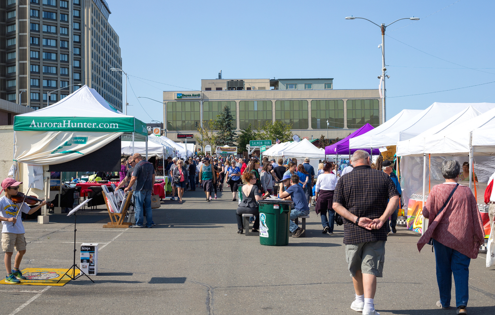 Pictured during the worst time to visit Anchorage, Alaska, a crowded farmer's market seen in downtown