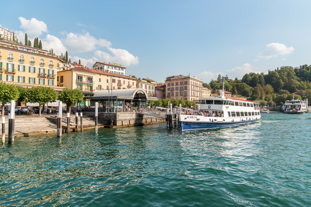 Ferry boat on the water right outside Lombardy/Bellagio for a guide to the best time to visit Lake Como