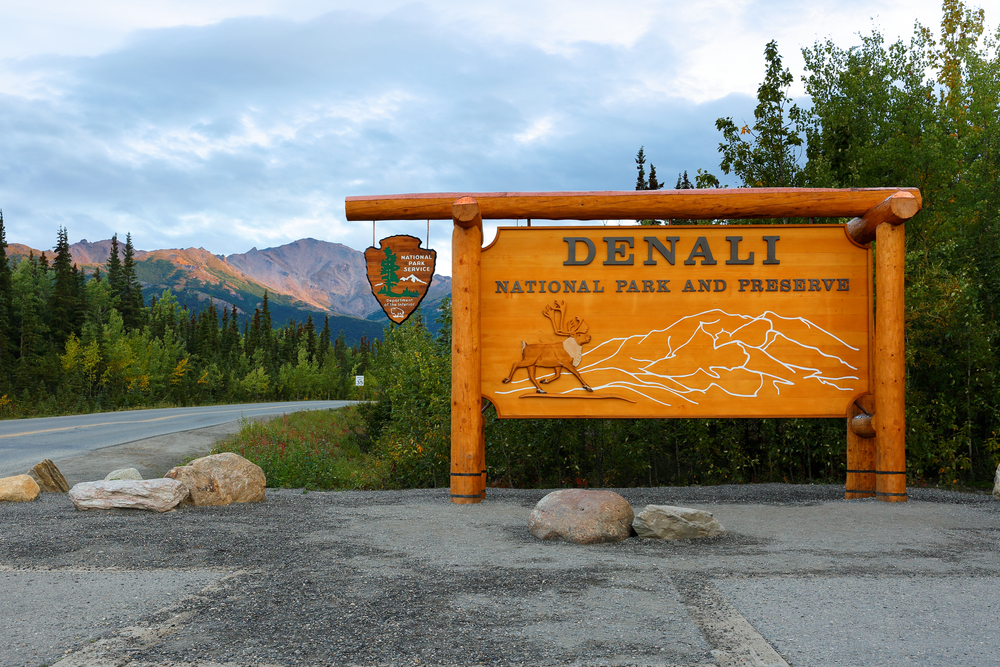 Photo of a sign that says Denali National Park sits outside the entrance to the park