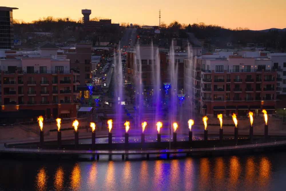 Skyline of the waterfront at night in the downtown area for a guide titled Best Time to Visit Branson