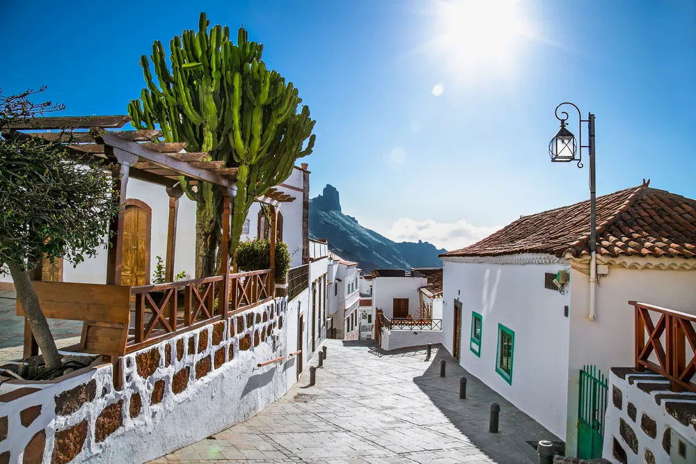 Tejeda village in Gran Canaria pictured during the least busy time to visit the Canary Islands, with gorgeous white buildings and old stone walkways