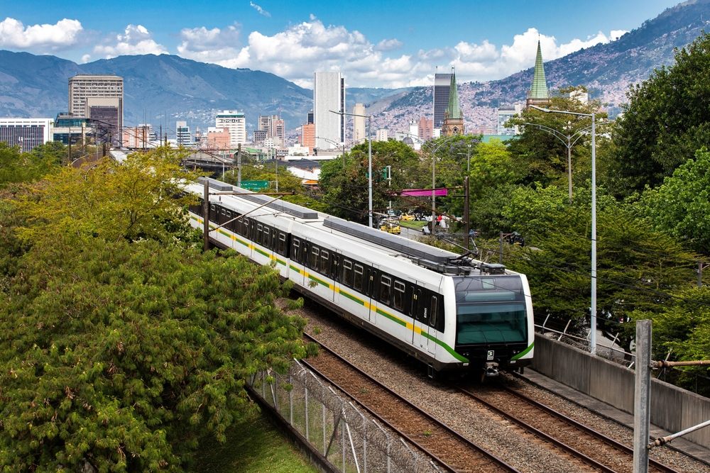 City train pictured running on the outskirts of town for a guide to the best time to visit Medellin