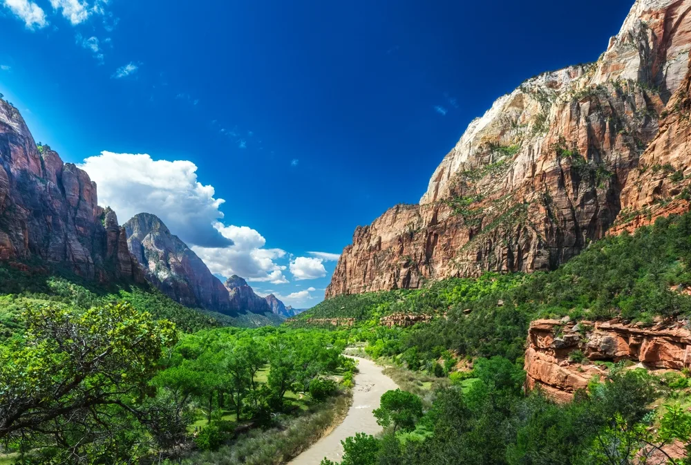 Neat view of the Narrow in Zion pictured under a blue sky with hardly anyone around in the spring, the overall best time to visit Utah