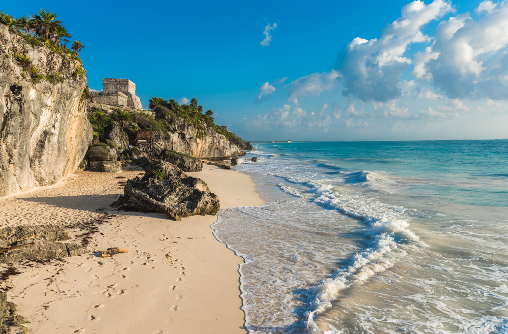 Ruins by the beach in the Yucatan Peninsula pictured during the best time to visit Tulum, the late winter and early spring