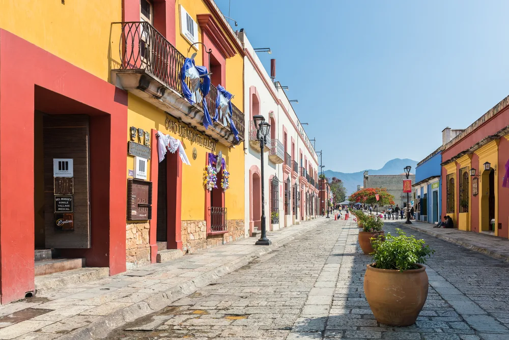 Photo of colorful buildings on cobblestone streets in Oaxaca, Mexico during the overall best time to visit the country