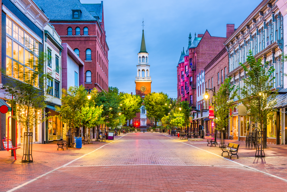 Postcard-worthy empty street on a nice spring evening in Burlington, Vermont pictured during the cheapest time to visit New England