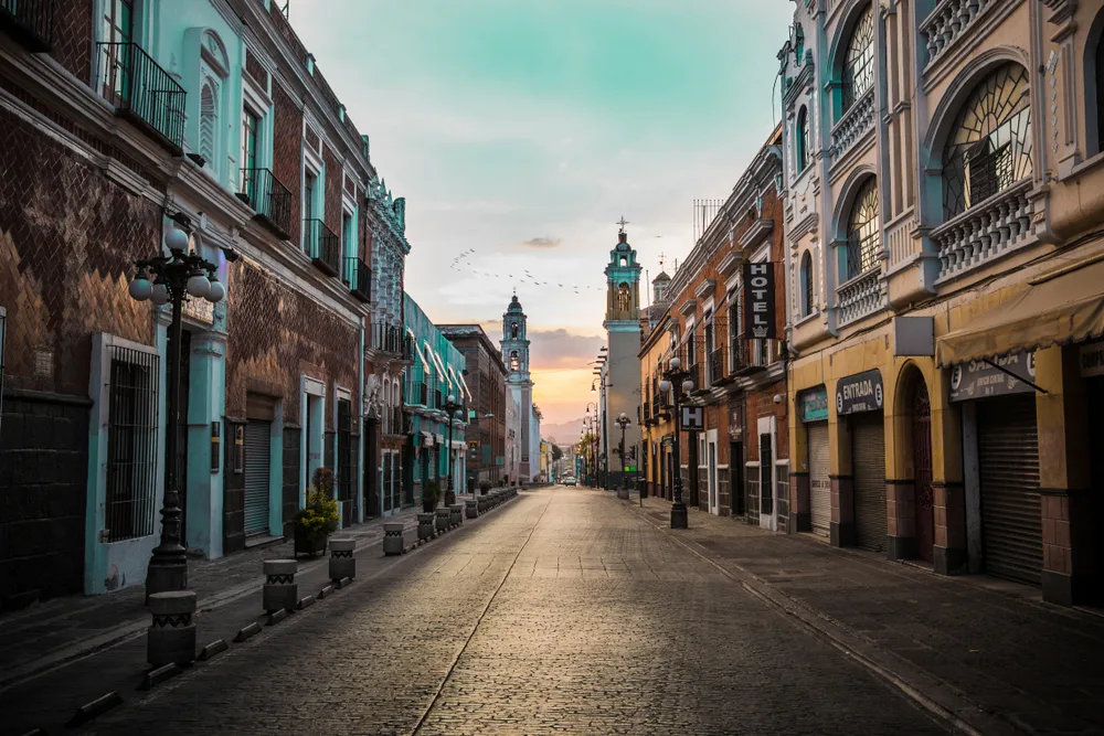 Sun rising over Puebla, Mexico during the spring, the least busy time to visit Mexico