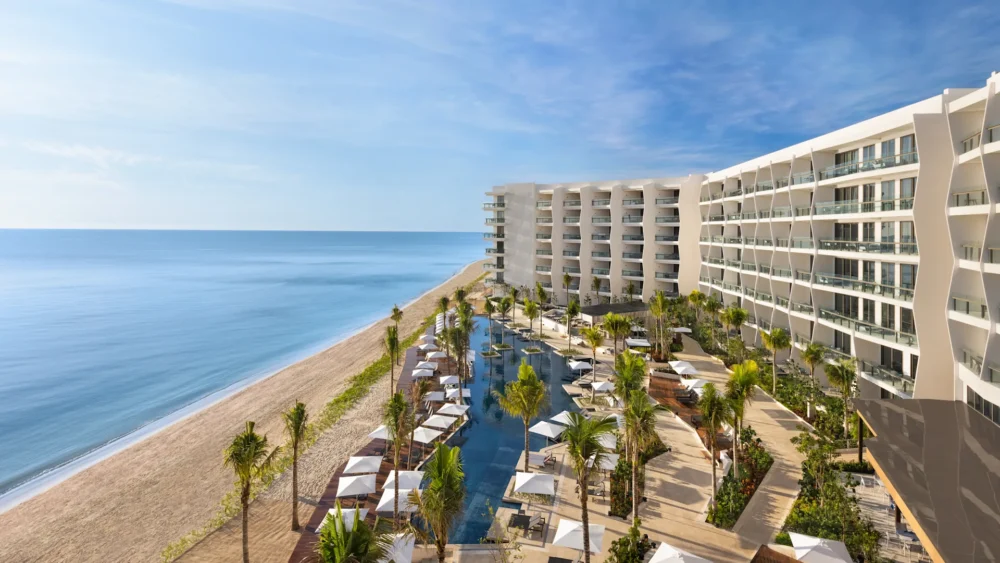 Exterior aerial beach shot of Hilton Cancun, one of the best all-inclusive resorts in Cancun