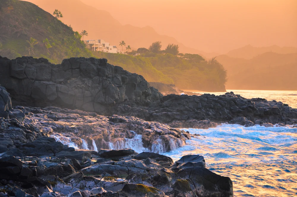 Gorgeous sunset at Queen's Bath on Kauai, one of the best places to visit if you only have 5 days
