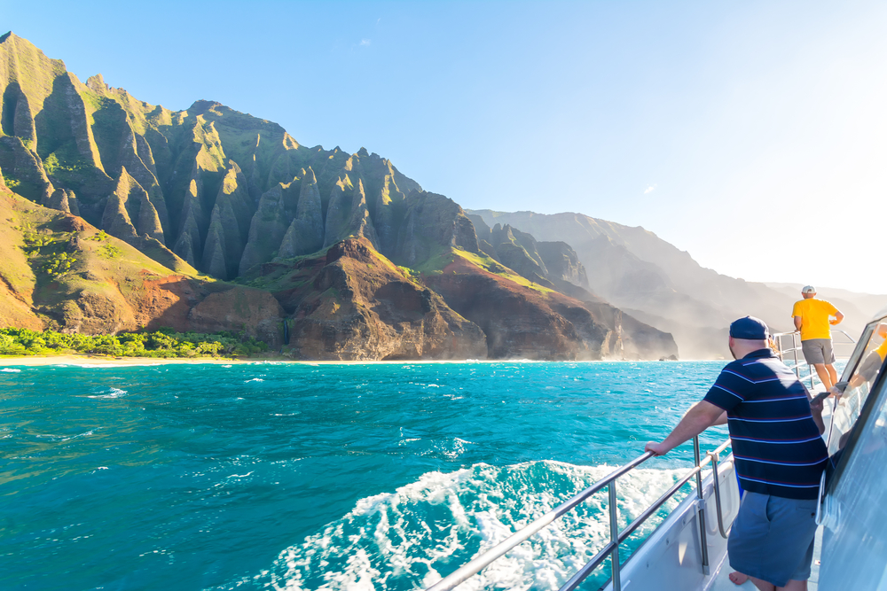 People on a catamaran on the Na Pali Coast